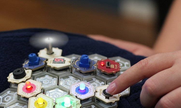 A child building an interactive wearable vest